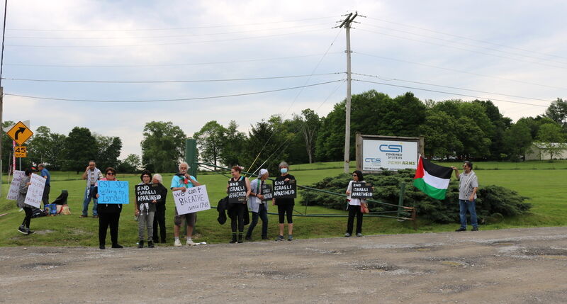 Protesters picket outside Combined Systems